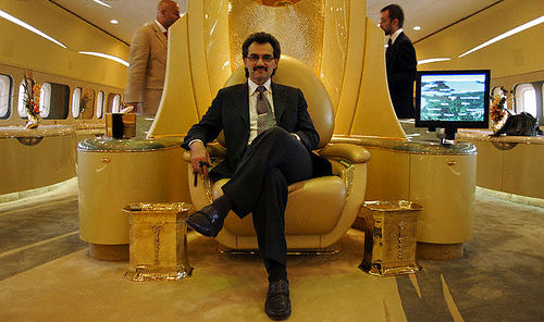 Prince Alwaleen sitting on his throne inside his private (Boeing 747) jet